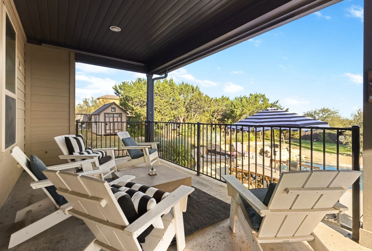 Covered terrace with loungers looking over the hill country