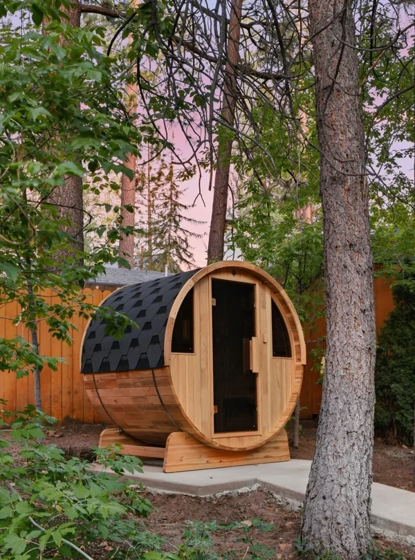 Barrel sauna among the pine trees