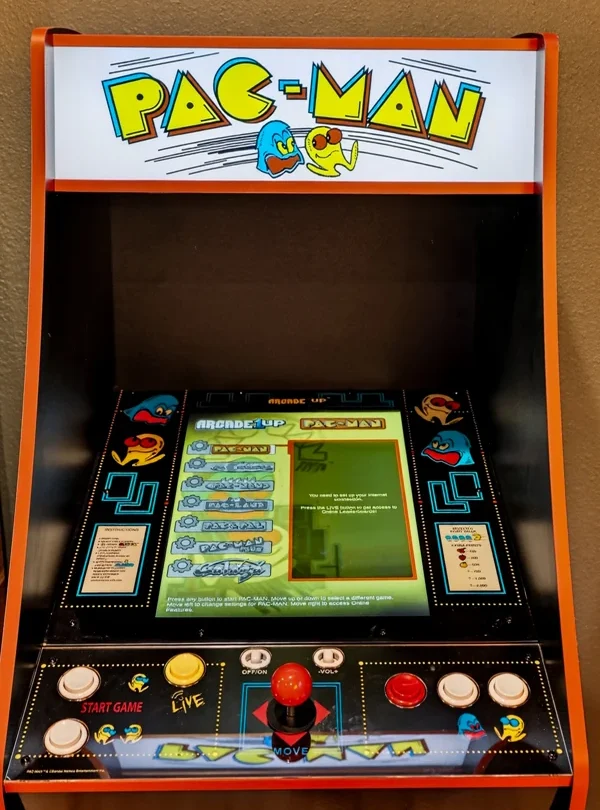 Pac-Man arcade cabinet in the games room
