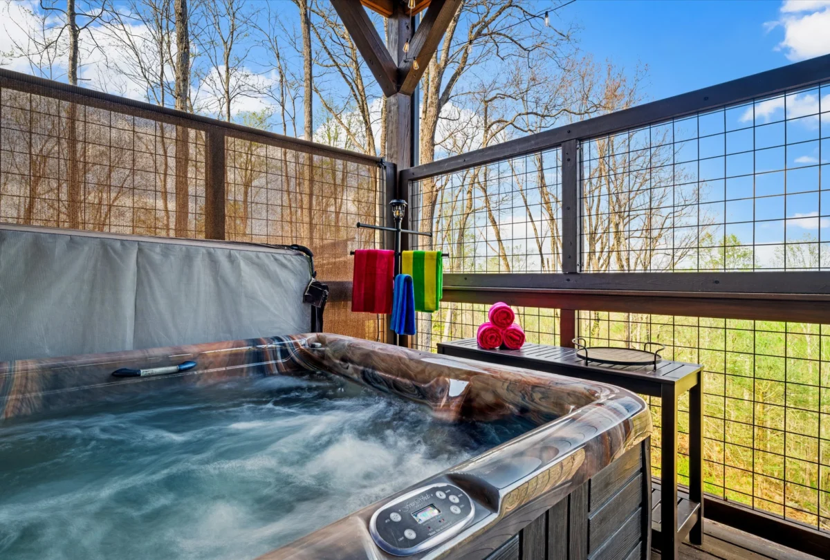Hot tub on the deck looking into the woodland
